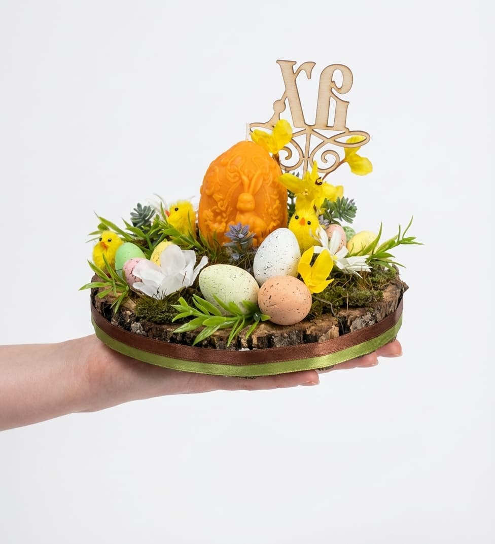 Слика на Декоративен велигденски аранжман со јајца и свеќа